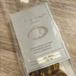 Jazz Braid" by the "Afro Beauty Collection Crown"